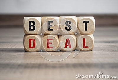 Cubes and dice with words best deal on wooden background Stock Photo