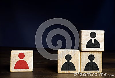 Cubes with figures as symbol Unfair Dismissal of an employee. Stock Photo