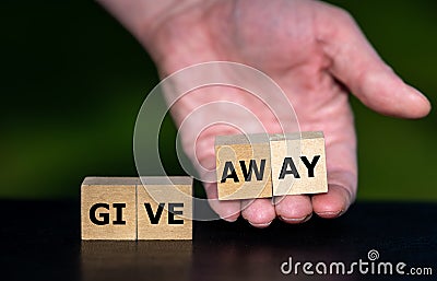 Cubes form the expression `give away`. Stock Photo