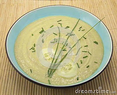 Cucumber and avocado soup on bamboo placemat Stock Photo