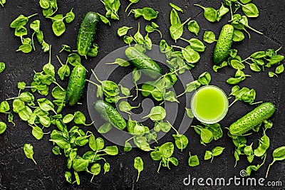 Cucumber, celeriac. Vegetables for greeny organic smoothy for sport diet on dark background top view mockup Stock Photo