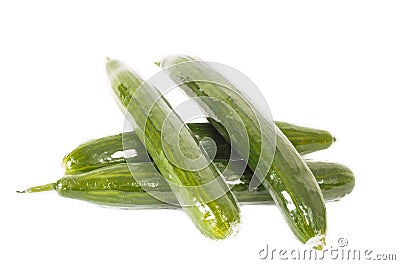 Cucumbers in heat shrink film on white Stock Photo