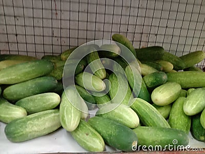 Cucumbers on the shelf ready for sale to make various dishes Stock Photo