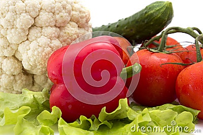 Cucumbers, tomatoes, peppers, lettuce, cauliflower Stock Photo