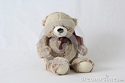 Cuddly stuffed teddy bear on a white neutral background Stock Photo