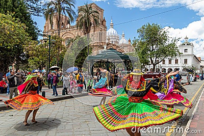 A group of folk dancers from Cayambe, Ecuador, in historical center of Cuenca Editorial Stock Photo