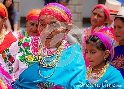 A senior woman folk dancer from Cayambe Canton, Pichincha Province, Ecuador Editorial Stock Photo