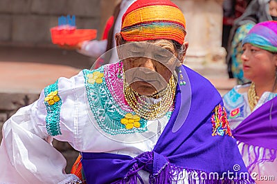 A senior woman folk dancer from Cayambe Canton, Pichincha, Ecuador Editorial Stock Photo