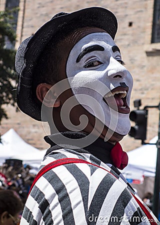 Cuenca, Ecuador - November 3, 2015 -A mime clown entertains the crowd Editorial Stock Photo