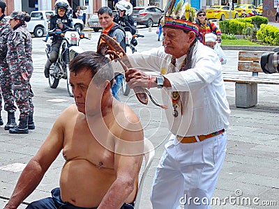 Indigenous healer performing ceremony of cleaning, Ecuador Editorial Stock Photo