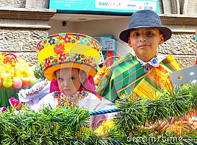 Cuenca, Ecuador. Parade Pase del Nino Viajero, Girl and boy dressed up for parade Editorial Stock Photo