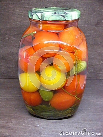 Cuisine of Belarus, russian cuisine: tomato and cucumber tradional jar Stock Photo