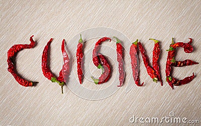Cuisine. Word with dried red hot chili pepper Stock Photo