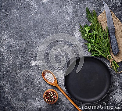 Culinary background with spices, pan and knife Stock Photo