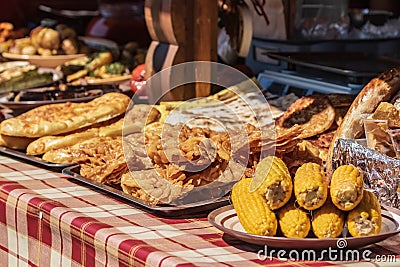 Culinary buffet with a presentation of a variety of healthy food - meat, sausage, grilled vegetables. Stock Photo