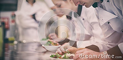 Culinary class in kitchen making salads Stock Photo