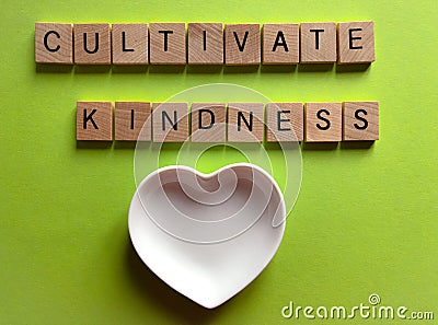 Cultivate Kindness, and ceramic heart shape Stock Photo