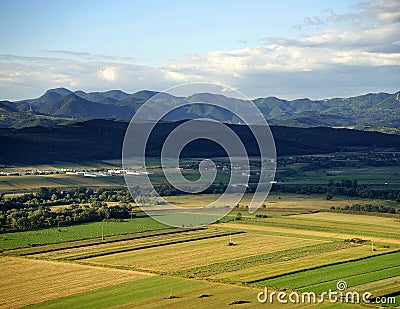 Cultivated land in a rural landscape Stock Photo