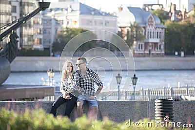 Cultural diversity in Moscowy - couples walking the waterfront p Editorial Stock Photo