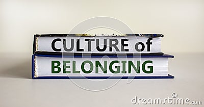 Culture of belonging symbol. Books with words 'culture of belonging' Stock Photo