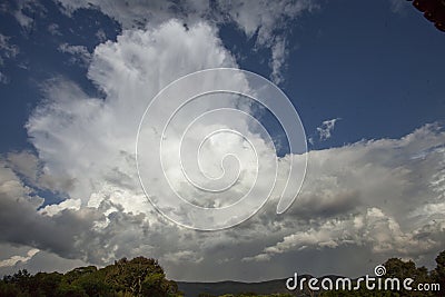 Thunderstorm forming over the hills of Minas Gerais. Stock Photo