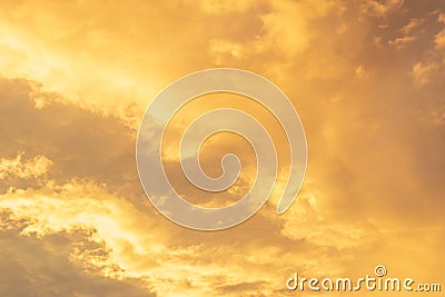 Cumulus, cirrus, clouds on pale pink and gold sky with glow, shine, light up, natural background Stock Photo