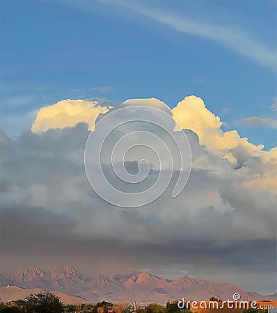 Cumulus Clouds billow over the Mountains of Southern New Mexico Stock Photo