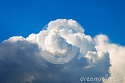 Cumulus clouds on a blue sky Stock Photo