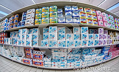 Toilet paper packs of different brands for sale in Italian supermarket Editorial Stock Photo