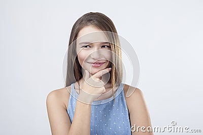 Cunning girl in blue dress Stock Photo