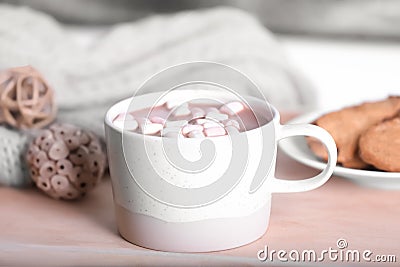 Cup of aromatic cacao with marshmallows on wooden tray Stock Photo