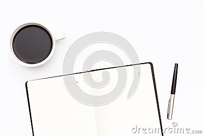 Cup of black coffee, open the diary and pen on a white background. Minimal business concept. Stock Photo