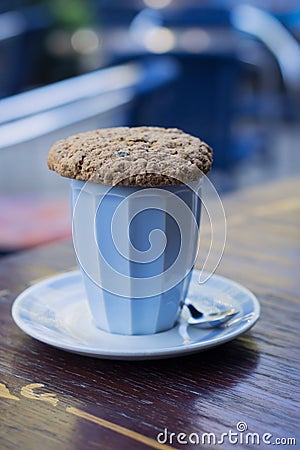 Cup of cappuccino with oat cookie Stock Photo