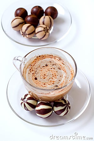Cup of cappucino and candies Stock Photo