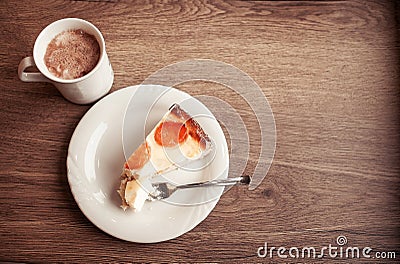 A cup of chocolate with cake on the white plate. Stock Photo
