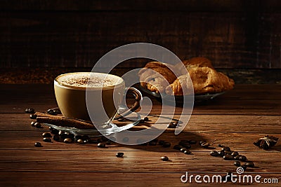 Cup of coffe Cappuccino with milk on a dark background. Hot coffe ,latte or Cappuccino prepared with milk on a wooden table with Stock Photo