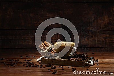 Cup of coffe Cappuccino with milk on a dark background. Hot coffe ,latte or Cappuccino prepared with milk on a wooden table with Stock Photo