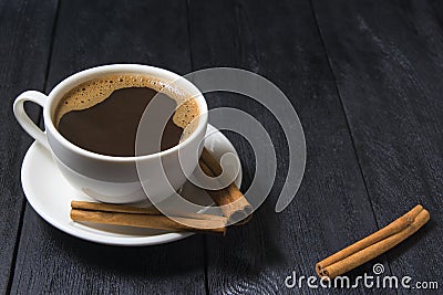 Cup of coffee on wooden table Stock Photo