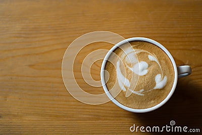 A cup of coffee on the brown background Stock Photo