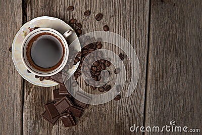 A cup of coffee, coffee beans and chocolate Stock Photo
