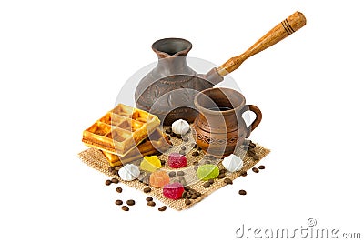 Cup of coffee, coffeepot, waffles, coffee beans and marmalade candy isolated on white Stock Photo