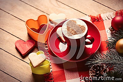 Cup of coffee, cookies and christmas decorations Stock Photo