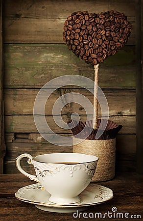 Cup of coffee with a decorative topiary Stock Photo