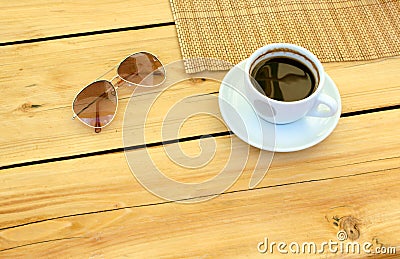 cup of coffee, glasses, water on table Stock Photo