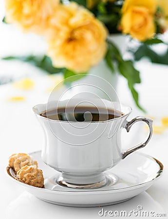 Cup of coffee. Good morning. Yellow flowers Stock Photo