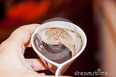 Cup of coffee ground in hand Stock Photo