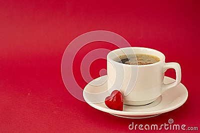 Cup of coffee isolated on red background. View from above. Web design, poster, invitation card. Valentine's Day concept Stock Photo