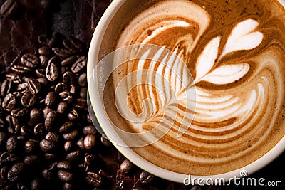 A Cup of Coffee with Latte Art Stock Photo