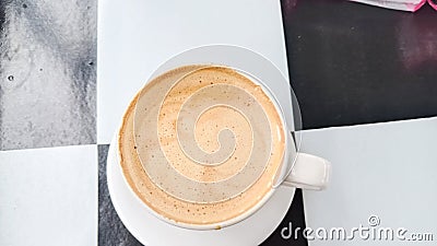 a cup of coffee without the latte art in a white cup and with black and white square background Stock Photo