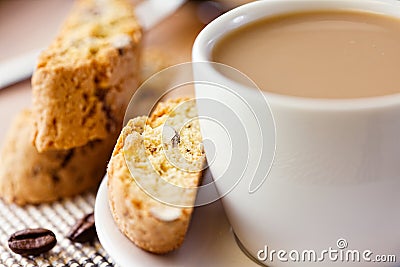 Cup of coffee with milk and cantuccini Stock Photo